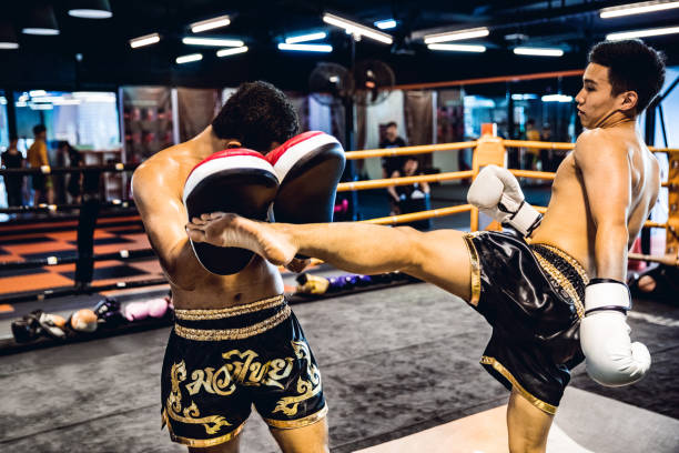High intensity Muay Thai pad work