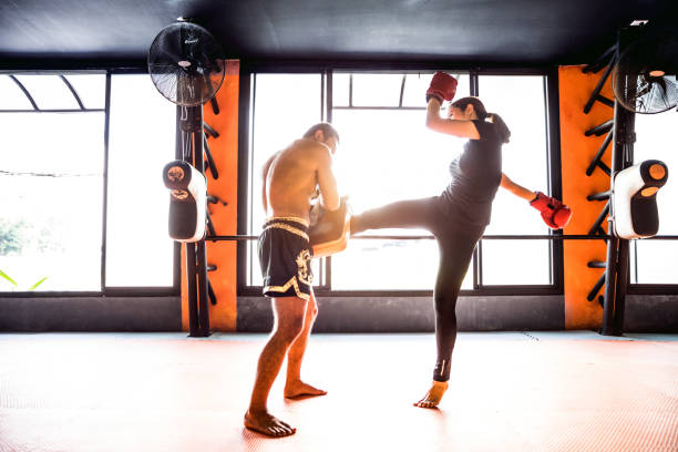 Kickboxing padwork with a trainer